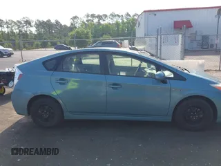 2014 Toyota Prius Four with VIN JTDKN3DUXE1852835, listed as a IAAI auction lot 42234128 with 189,512 mi miles and . Bid and sale history available at DreamBid. Image 13.