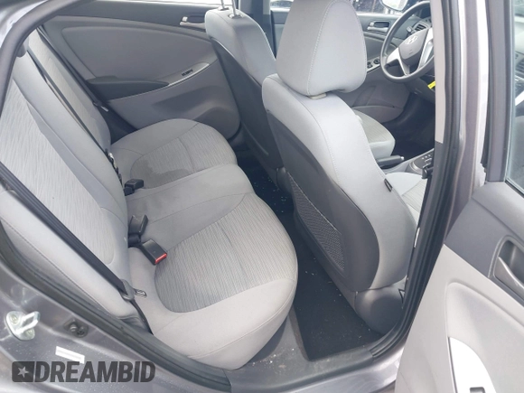 2015 Hyundai Accent GLS with VIN KMHCT4AE8FU825898, listed as a IAAI auction lot 42066640 with 79,593 mi miles and . Bid and sale history available at DreamBid. Image 8.