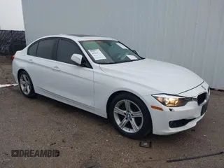2013 BMW 3 Series 328i with VIN WBA3C1G55DNN93551, listed as a IAAI auction lot 41196707 with 165,735 mi miles. Bid and sale history available at carsss.com. Image 1.