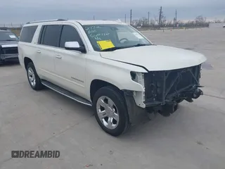 2015 Chevrolet Suburban LTZ with VIN 1GNSCKKC7FR641421, listed as a IAAI auction lot 41637137 with 139,001 mi miles and . Bid and sale history available at DreamBid. Image 1.