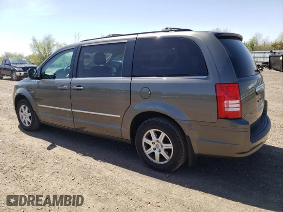 2010 Chrysler Town & Country Touring Plus with VIN 2A4RR8D11AR405610, listed as a Copart auction lot 54742655 with 56,380 mi miles and Salvage Title. Bid and sale history available at DreamBid. Image 2.