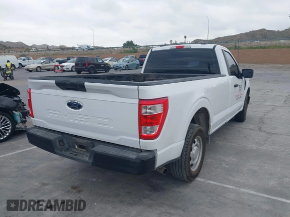 2022 Ford F-150 XL with VIN 1FTMF1CB4NKE51463, listed as a IAAI auction lot 42034226 with 82,658 mi miles and . Bid and sale history available at DreamBid. Image 4.