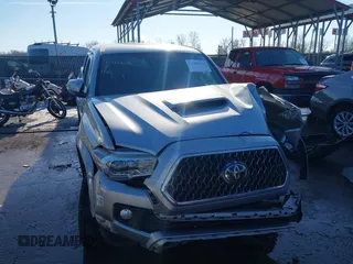 2018 Toyota Tacoma SR with VIN 5TFCZ5AN3JX151479, listed as a IAAI auction lot 41428376 with 104,717 mi miles. Bid and sale history available at carsss.com. Image 12.