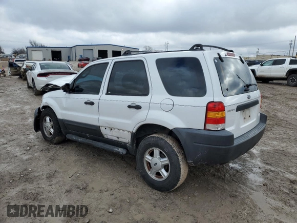 2004 Ford Escape XLS with VIN 1FMYU02144DA18217, listed as a Copart auction lot 43136895 with 135,424 mi miles and Salvage Title. Bid and sale history available at DreamBid. Image 2.