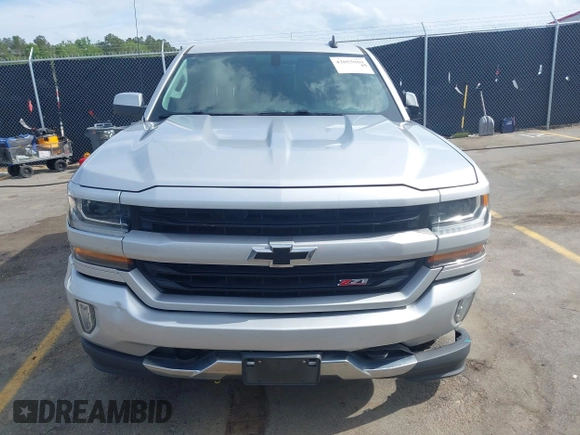 2017 Chevrolet Silverado 1500 LT with VIN 3GCUKREC5HG285689, listed as a IAAI auction lot 42055959 with 128,237 mi miles and . Bid and sale history available at DreamBid. Image 12.
