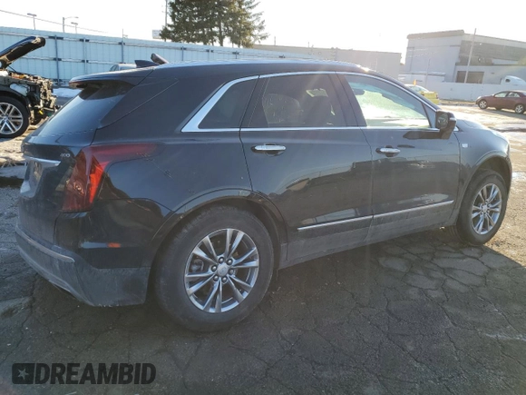 2021 Cadillac XT5 AWD Premium Luxury with VIN 1GYKNDRS6MZ111640, listed as a Copart auction lot 46567035 with 57,484 mi miles and Salvage Title. Bid and sale history available at DreamBid. Image 3.