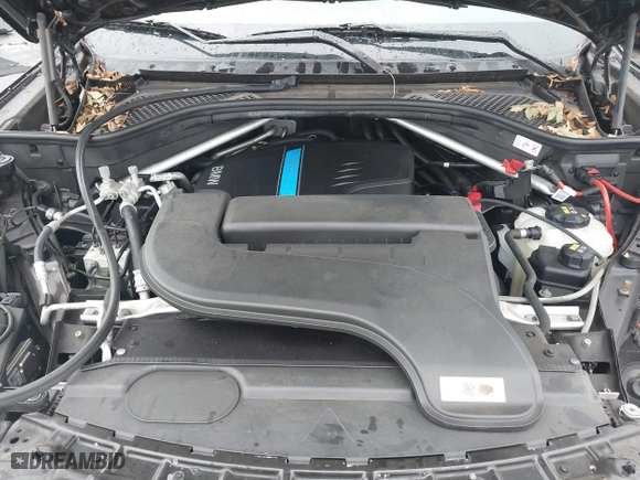 2018 BMW X5 xDrive40e iPerformance with VIN 5UXKT0C54J0V99573, listed as a IAAI auction lot 41490567 with 50,650 mi miles. Bid and sale history available at carsss.com. Image 10.