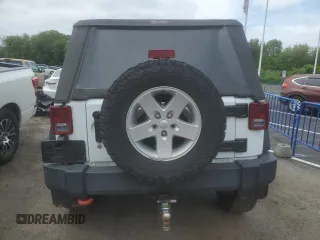 2018 Jeep Wrangler Sport S z VIN 1C4AJWAG8JL867954, wystawiony jako Copart lot #57175235 z przebiegiem 69 390 mil mil oraz Szkoda całkowita • Salvage title. Historia ofert i sprzedaży dostępna na DreamBid. Obrazek 6.