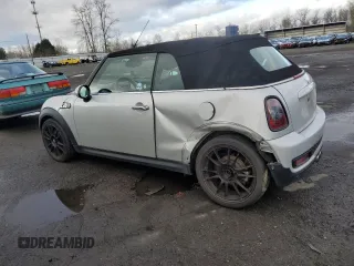 2013 MINI Convertible S with VIN WMWZP3C55DT297215, listed as a Copart auction lot 87995095 with Not provided miles and Salvage title. Bid and sale history available at DreamBid. Image 2.