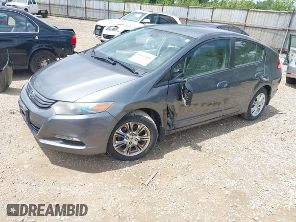 2010 Honda Insight EX with VIN JHMZE2H71AS008487, listed as a IAAI auction lot 42533409 with 95,765 mi miles and . Bid and sale history available at DreamBid. Image 2.
