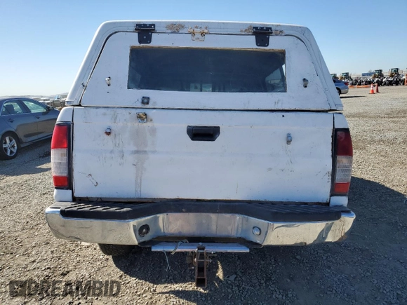 1999 Nissan Frontier XE с VIN 1N6ED26Y1XC308545, выставлен на аукционе Copart как лот 80168984 с пробегом Не указан миль и Списание • Salvage title. История ставок и продаж доступна на DreamBid. Изображение 6.