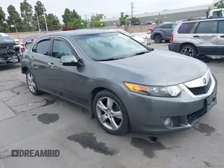 2010 Acura TSX z VIN JH4CU2F67AC003694, wystawiony jako IAAI lot #42171441 z przebiegiem 143 883 mil mil oraz . Historia ofert i sprzedaży dostępna na DreamBid. Obrazek 1.