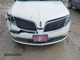 2013 Lincoln MKS EcoBoost with VIN 1LNHL9FT4DG604661, listed as a IAAI auction lot 42211781 with 134,902 mi miles and . Bid and sale history available at DreamBid. Image 6.