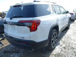 2021 GMC Acadia SLT with VIN 1GKKNMLS2MZ163379, listed as a IAAI auction lot 41614025 with 61,232 mi miles. Bid and sale history available at carsss.com. Image 4.
