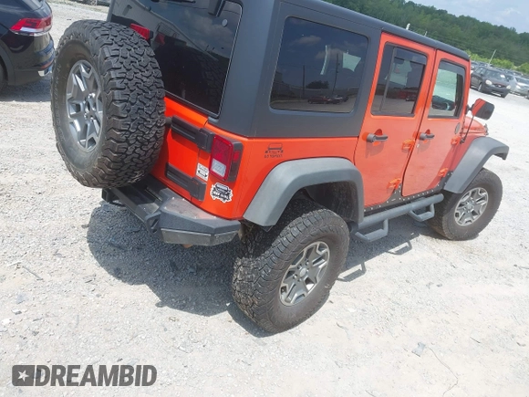2015 Jeep Wrangler Unlimited Rubicon z VIN 1C4BJWFG4FL598033, wystawiony jako IAAI lot #42435523 z przebiegiem 134 202 mil mil oraz . Historia ofert i sprzedaży dostępna na DreamBid. Obrazek 4.