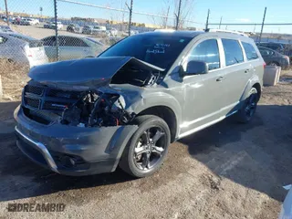 2019 Dodge Journey Crossroad with VIN 3C4PDCGG9KT857575, listed as a IAAI auction lot 41290197 with 91,051 mi miles. Bid and sale history available at carsss.com. Image 2.