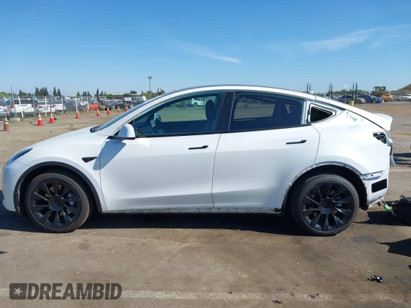 2022 Tesla Model Y Long Range with VIN 7SAYGDEE1NF364241, listed as a IAAI auction lot 42190272 with 54,878 mi miles and . Bid and sale history available at DreamBid. Image 14.
