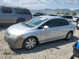 2006 Honda Civic LX with VIN 1HGFA165X6L058657, listed as a Copart auction lot 59307565 with 254,786 mi miles and Salvage title. Bid and sale history available at DreamBid. Image 1.
