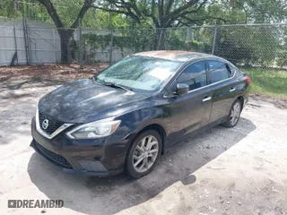 2016 Nissan Sentra S with VIN 3N1AB7AP4GY210655, listed as a IAAI auction lot 41946054 with 165,068 mi miles. Bid and sale history available at carsss.com. Image 2.