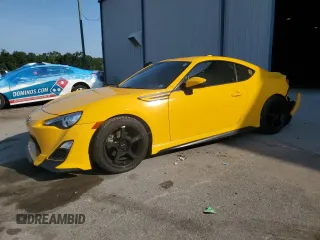2015 Scion FR-S z VIN JF1ZNAA1XF9705288, wystawiony jako Copart lot #59264595 z przebiegiem 97 011 mil mil oraz Szkoda całkowita • Salvage title. Historia ofert i sprzedaży dostępna na DreamBid. Obrazek 1.