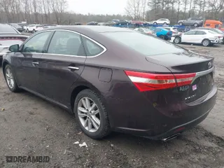 2014 Toyota Avalon Limited with VIN 4T1BK1EB9EU133483, listed as a IAAI auction lot 41744776 with 102,987 mi miles. Bid and sale history available at carsss.com. Image 3.