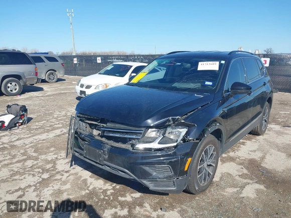 2020 Volkswagen Tiguan SE with VIN 3VV3B7AX0LM106561, listed as a IAAI auction lot 41712689 with 85,374 mi miles and . Bid and sale history available at DreamBid. Image 2.