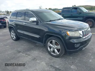 2012 Jeep Grand Cherokee Overland with VIN 1C4RJECT4CC299549, listed as a IAAI auction lot 41917306 with 229,256 mi miles. Bid and sale history available at carsss.com. Image 1.