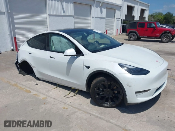 2023 Tesla Model Y Long Range with VIN 7SAYGDEE7PF865539, listed as a IAAI auction lot 42109673 with 34,923 mi miles and . Bid and sale history available at DreamBid. Image 1.