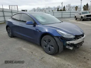 2023 Tesla Model 3 Long Range with VIN 5YJ3E1EB0PF388986, listed as a Copart auction lot 49823045 with 93,870 mi miles and Salvage Title. Bid and sale history available at DreamBid. Image 4.
