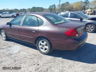 2001 Ford Taurus SES with VIN 1FAFP55U51G265509, listed as a IAAI auction lot 41886979 with 249,492 mi miles. Bid and sale history available at carsss.com. Image 3.