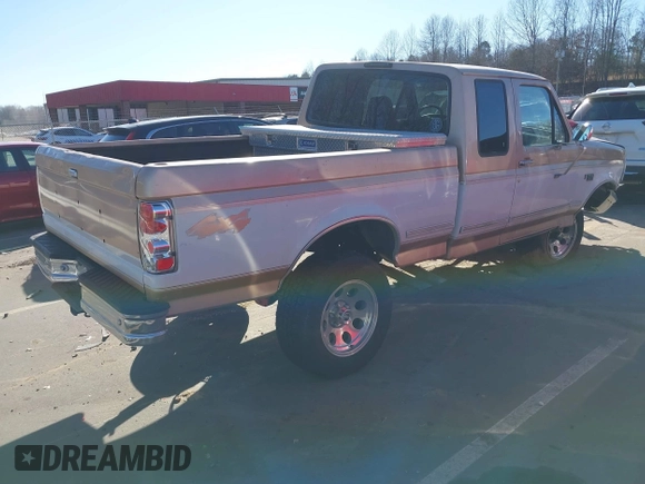 1996 Ford F-150 with VIN 1FTEX14N4TKA28292, listed as a IAAI auction lot 41422154 with 173,728 mi miles. Bid and sale history available at carsss.com. Image 4.