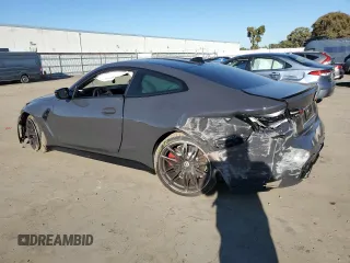 2023 BMW M4 Competition with VIN WBS33AZ01PCM59701, listed as a Copart auction lot 83067984 with 26,200 mi miles and Salvage Title. Bid and sale history available at carsss.com. Image 2.