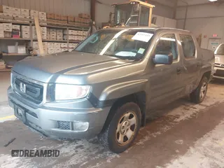 2009 Honda Ridgeline RT with VIN 5FPYK16279B104907, listed as a IAAI auction lot 42197433 with 244,260 mi miles. Bid and sale history available at carsss.com. Image 19.