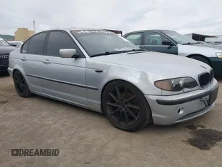 2003 BMW 3 Series 325i with VIN WBAAZ33403PH31680, listed as a IAAI auction lot 41726073 with 214,623 mi miles. Bid and sale history available at carsss.com. Image 1.