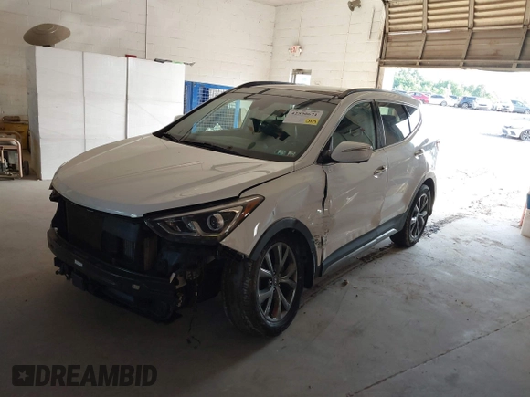 2017 Hyundai Santa Fe Ultimate with VIN 5XYZWDLA2HG491338, listed as a IAAI auction lot 42590671 with 114,521 mi miles and . Bid and sale history available at DreamBid. Image 2.