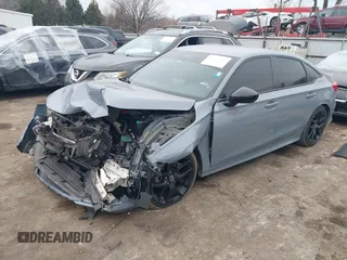 2024 Honda Civic Sport z VIN 2HGFE2F56RH513922, wystawiony jako IAAI lot #41320408 z przebiegiem 32 028 mil mil oraz . Historia ofert i sprzedaży dostępna na DreamBid. Obrazek 17.