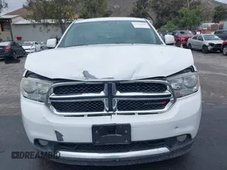 2013 Dodge Durango SXT z VIN 1C4RDHAG7DC694986, wystawiony jako IAAI lot #42181381 z przebiegiem 170 669 mil mil oraz . Historia ofert i sprzedaży dostępna na DreamBid. Obrazek 12.