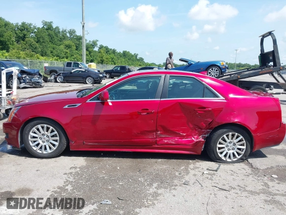 2013 Cadillac CTS Luxury with VIN 1G6DE5E55D0157455, listed as a IAAI auction lot 42469959 with 107,274 mi miles and . Bid and sale history available at DreamBid. Image 14.