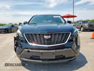 2023 Cadillac XT4 FWD Luxury z VIN 1GYAZAR42PF102696, wystawiony jako Copart lot #60524065 z przebiegiem 1 903 mil mil oraz Szkoda całkowita • Salvage title. Historia ofert i sprzedaży dostępna na DreamBid. Obrazek 5.