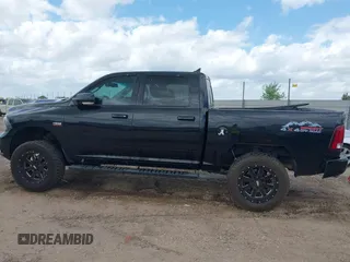 2014 Ram 1500 Sport with VIN 1C6RR7MT6ES233054, listed as a IAAI auction lot 41936407 with 144,759 mi miles and . Bid and sale history available at DreamBid. Image 14.
