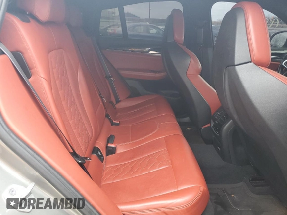 2021 BMW X4 M z VIN 5YMUJ0C03M9F20053, wystawiony jako Copart lot #87595845 z przebiegiem Nie podano mil oraz Szkody całkowita. Historia ofert i sprzedaży dostępna na DreamBid. Obrazek 11.