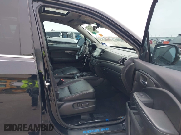 2022 Honda Ridgeline RTL-E with VIN 5FPYK3F75NB020036, listed as a IAAI auction lot 41500206 with 79,655 mi miles and . Bid and sale history available at DreamBid. Image 5.