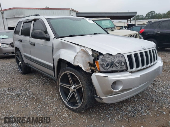 2005 Jeep Grand Cherokee Laredo z VIN 1J4GR48K05C506865, wystawiony jako IAAI lot #41539102 z przebiegiem 237 208 mil mil oraz . Historia ofert i sprzedaży dostępna na DreamBid. Obrazek 1.