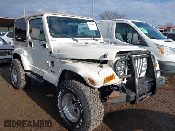 2002 Jeep Wrangler Sahara with VIN 1J4FA59S02P760345, listed as a IAAI auction lot 41634902 with 123,506 mi miles. Bid and sale history available at carsss.com. Image 1.