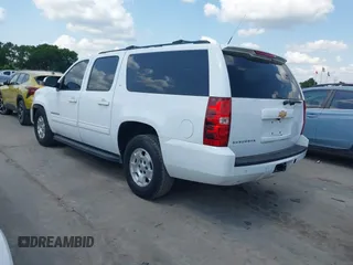 2013 Chevrolet Suburban LT with VIN 1GNSCJE08DR102735, listed as a IAAI auction lot 42228063 with 101,671 mi miles and . Bid and sale history available at DreamBid. Image 3.