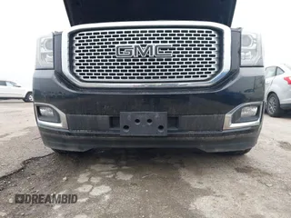 2017 GMC Yukon XL Denali with VIN 1GKS2HKJ2HR310377, listed as a IAAI auction lot 41153582 with 130,194 mi miles. Bid and sale history available at carsss.com. Image 21.