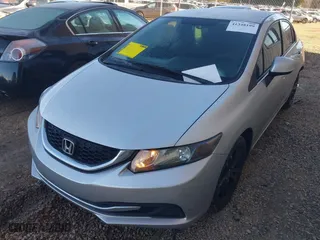 2013 Honda Civic Sdn LX with VIN 2HGFB2F54DH513399, listed as a IAAI auction lot 41348199 with 116,977 mi miles. Bid and sale history available at carsss.com. Image 2.