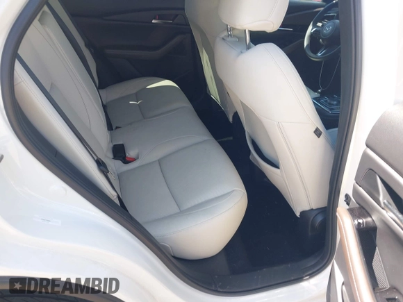 2024 Mazda CX-30 S Premium with VIN 3MVDMBDM8RM633580, listed as a IAAI auction lot 42152915 with 18,679 mi miles and . Bid and sale history available at DreamBid. Image 8.