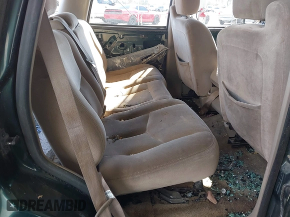 2003 GMC Yukon SLT z VIN 1GKEC13V43J304588, wystawiony jako IAAI lot #41525446 z przebiegiem Nie podano mil oraz . Historia ofert i sprzedaży dostępna na DreamBid. Obrazek 8.