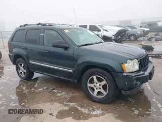 2005 Jeep Grand Cherokee Laredo with VIN 1J4GS48K45C677011, listed as a IAAI auction lot 41121018 with 210,814 mi miles and . Bid and sale history available at DreamBid. Image 1.